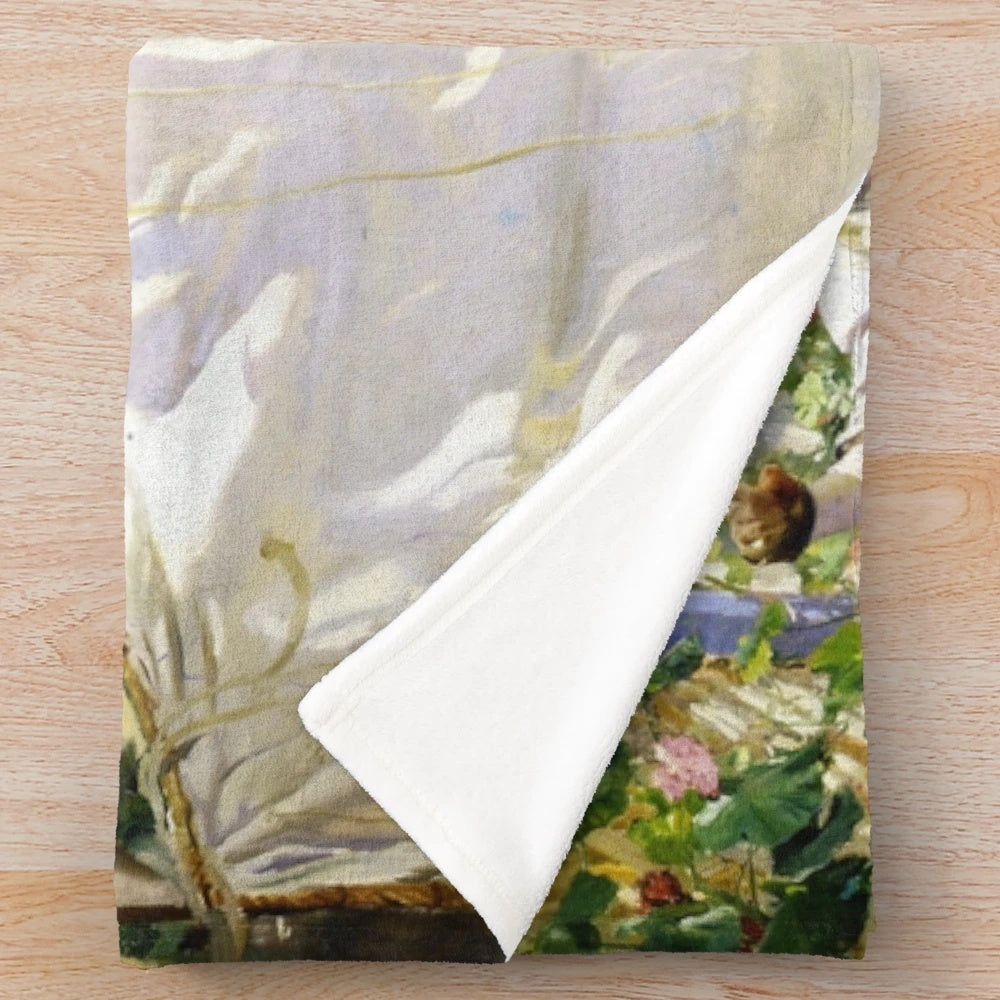 Sorolla's 'Sewing the Sail' 1896 painting on a plush blanket