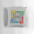 Sorry! board game featuring colorful playing pieces and a game board