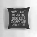 A funny pillow with the text "Sorry I Can't I'm Watching True Crime Documentaries With My Cat