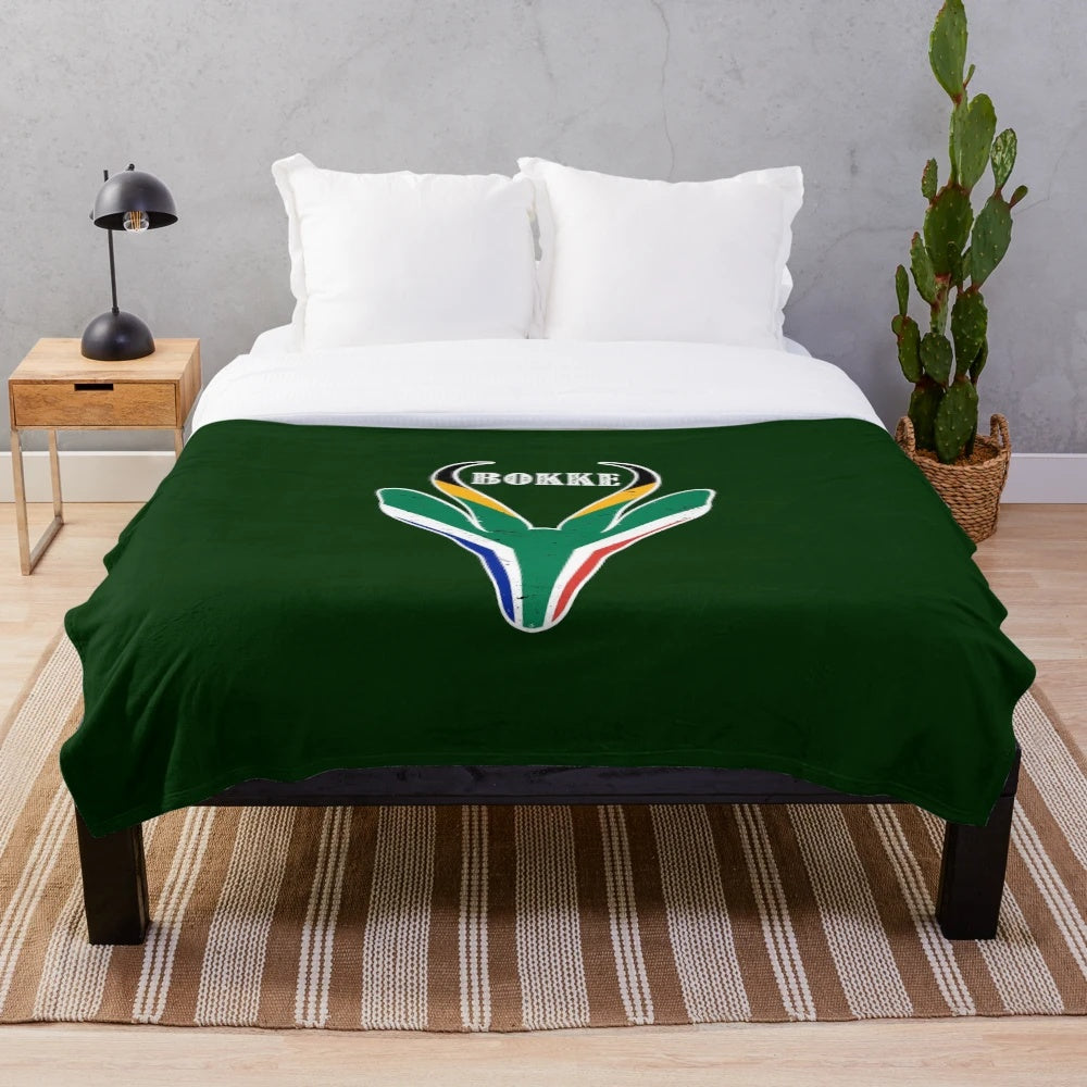 Springboks-inspired plush blanket featuring the South Africa flag design