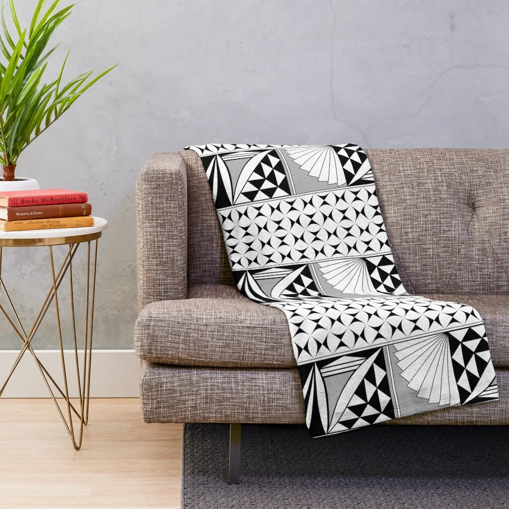 Southwest-inspired native plush blanket in gray color