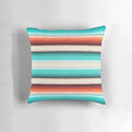 Decorative throw pillow featuring a southwest-inspired design with navajo white, turquoise, and burnt orange stripes