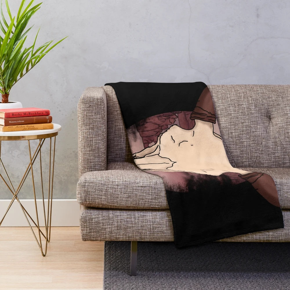Cozy plush blanket featuring a bison skull design in earthy southwestern tones
