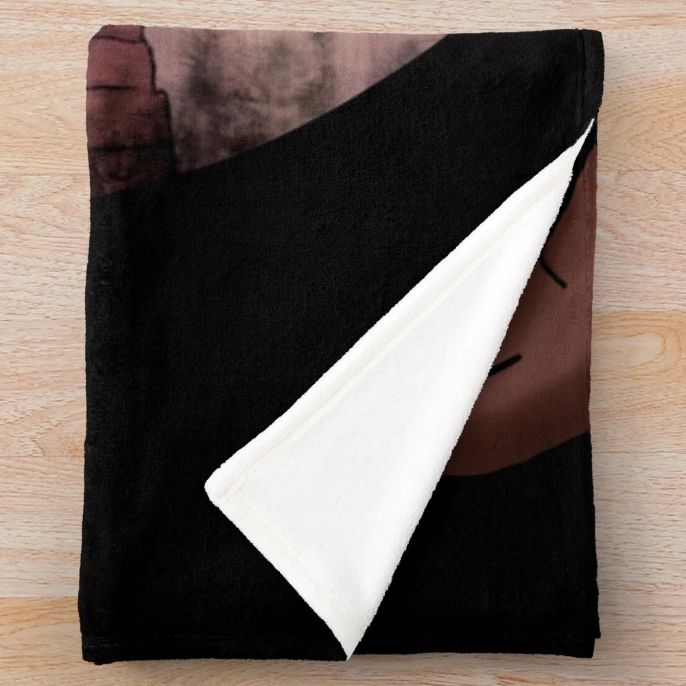 Cozy plush blanket featuring a bison skull design in earthy southwestern tones