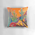 Vibrant throw pillow featuring a sunset landscape with ocotillo, saguaro, and quail silhouettes