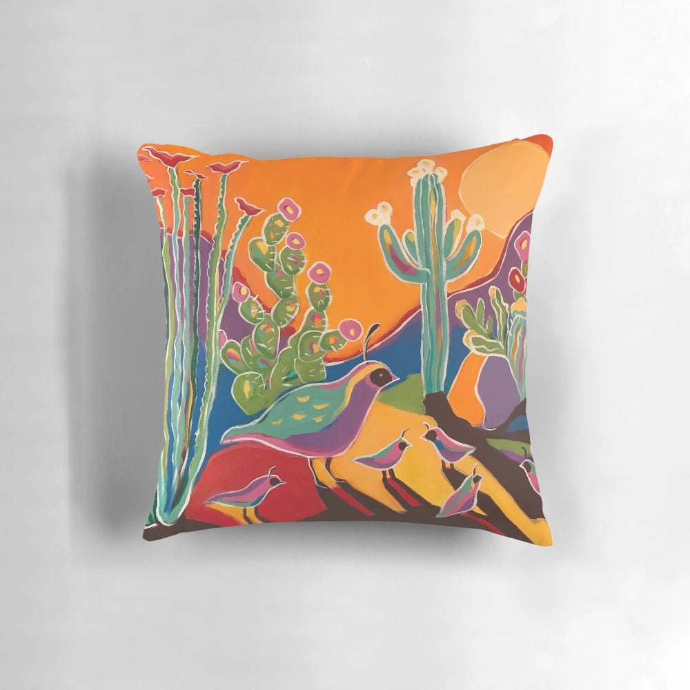 Vibrant throw pillow featuring a sunset landscape with ocotillo, saguaro, and quail silhouettes