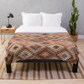 Southwestern tribal distressed rug plush blanket with geometric and modern design