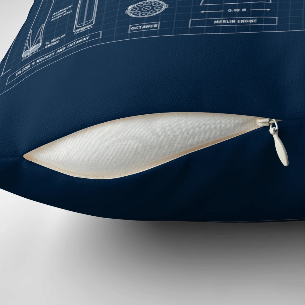 Detailed navy blueprint design of the SpaceX Falcon 9 and Starship spacecraft on a pillow