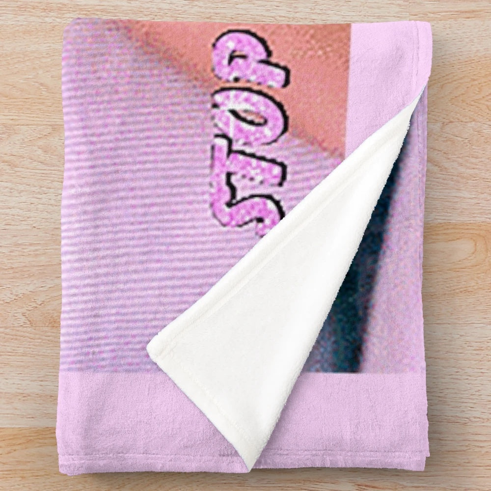 Soft, shimmery pink plush blanket with a y2k-inspired aesthetic