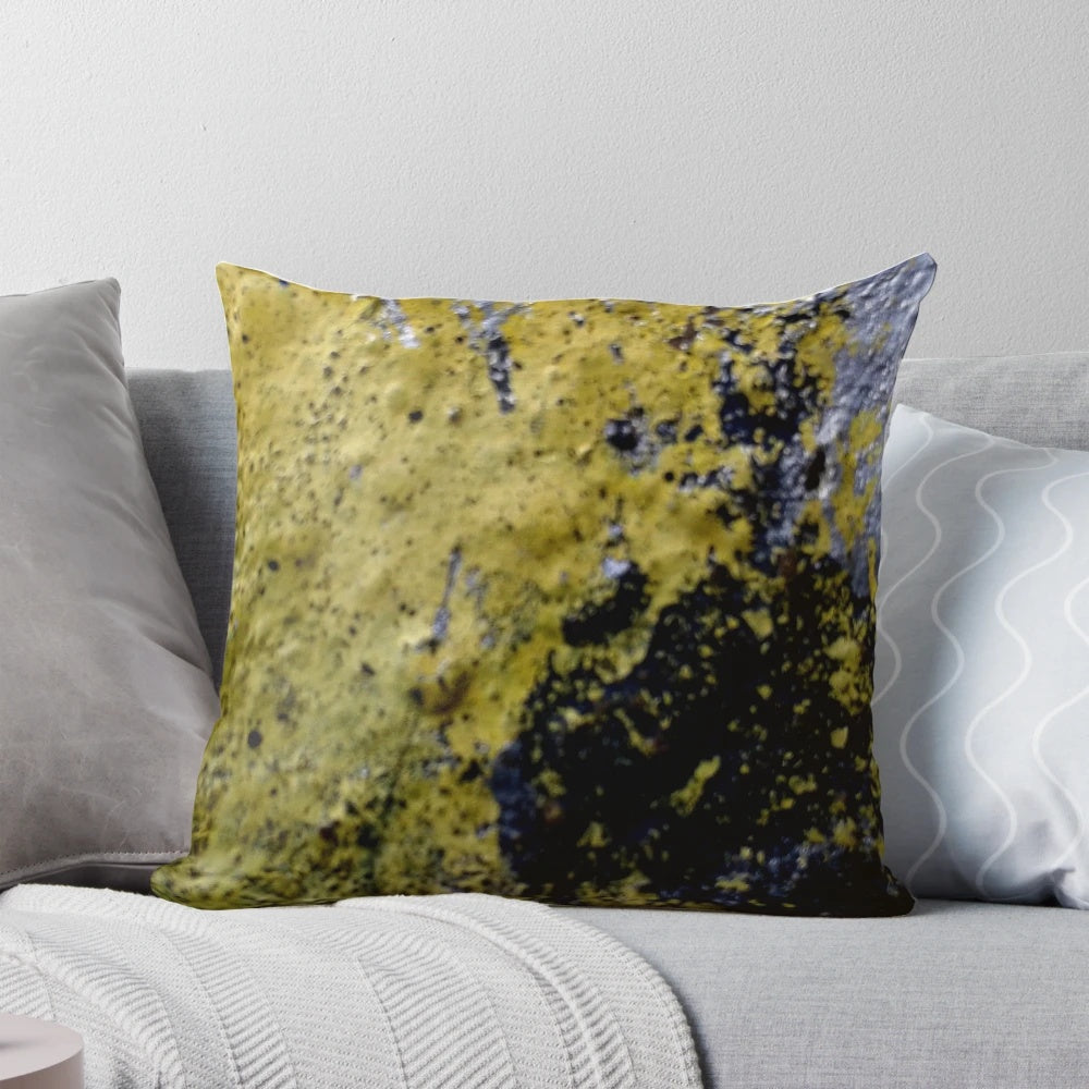 Spattered yellow brick pillow with a grungy, artsy design for an urban industrial vibe