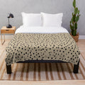 Speckled polka dot dalmatian pattern plush blanket in neutral colors