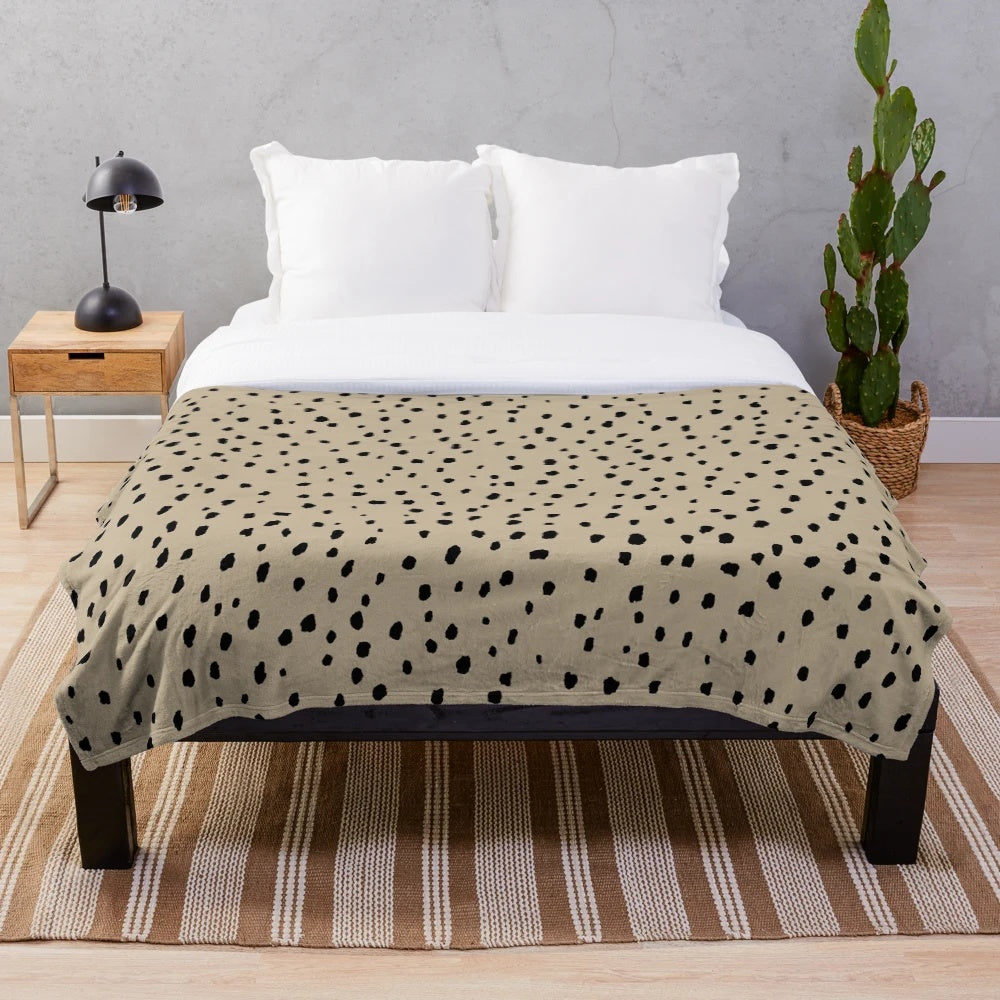 Speckled polka dot dalmatian pattern plush blanket in neutral colors