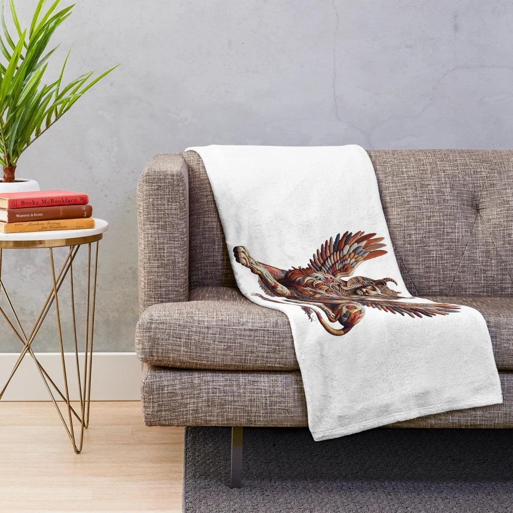 Embroidered sphinx-themed plush blanket