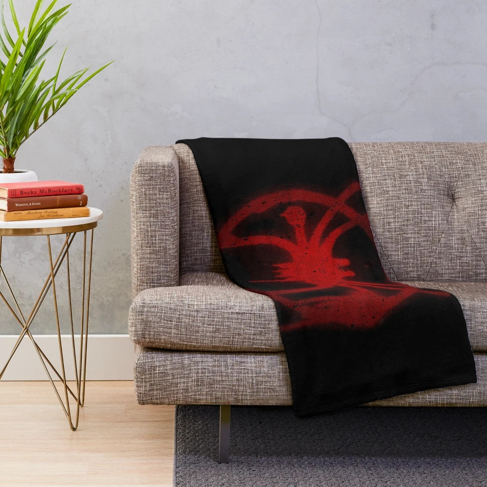 Spider-Verse inspired plush blanket featuring the spider symbol of Miles Morales