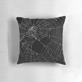 Black and white spiderweb pattern pillow with a detailed, distressed design.