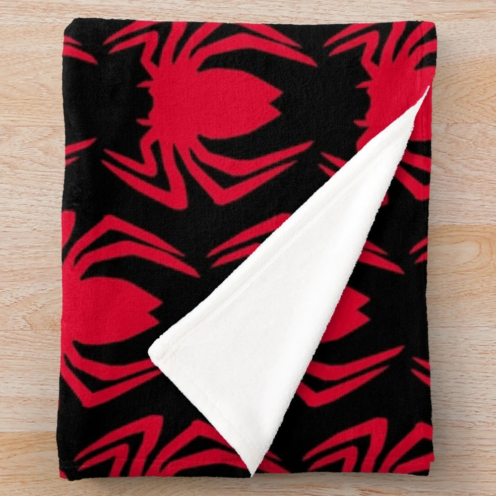 Spider logo plush blanket featuring a graphic design inspired by superhero movies