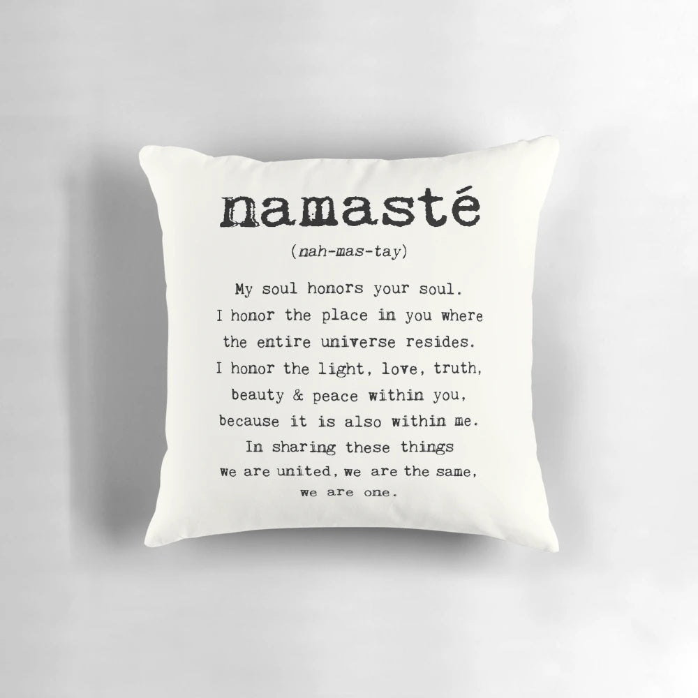 Vintage-style typewriter art pillow featuring the word "Namaste" in a calming, spiritual design.