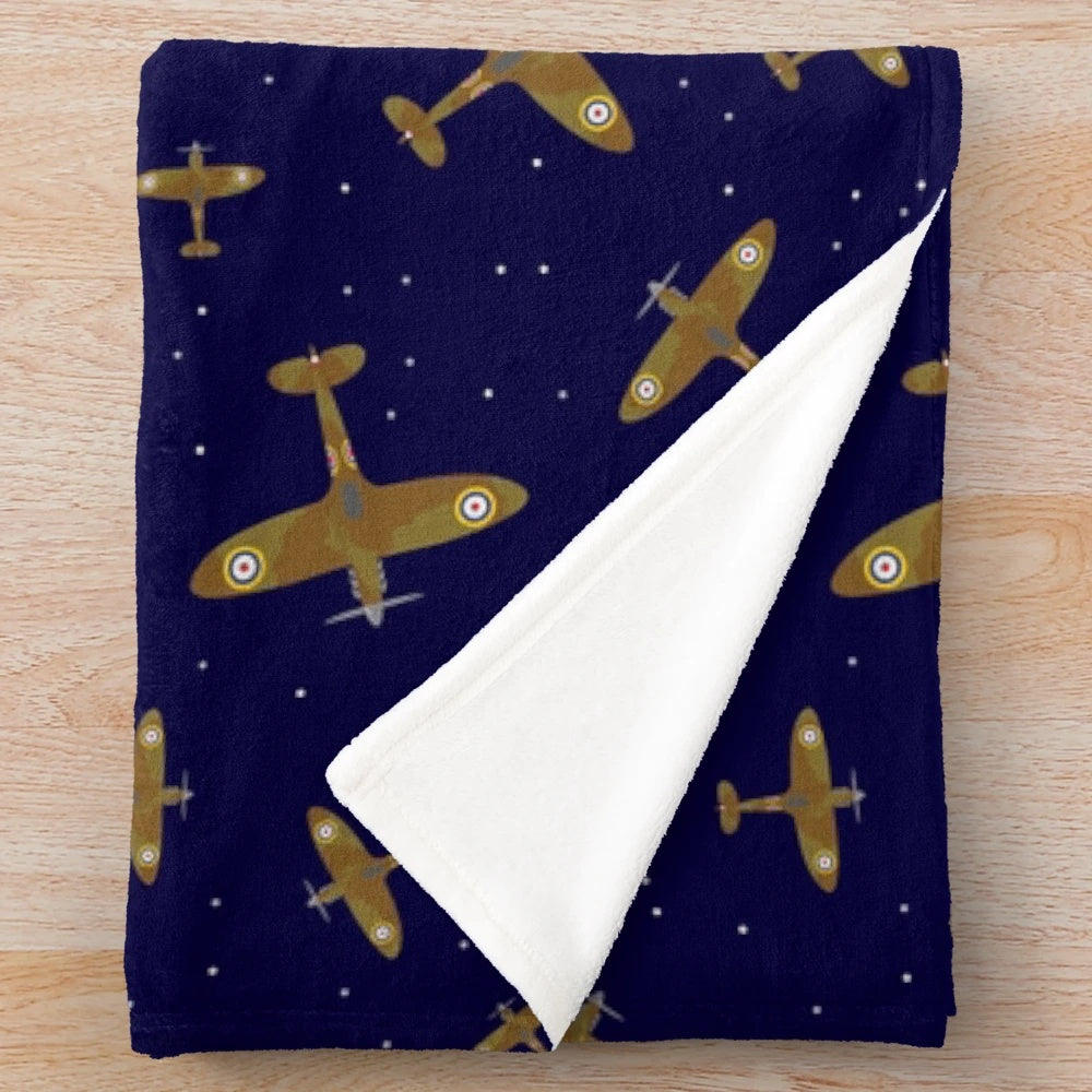 Spitfire war planes in flight on a navy blue plush blanket