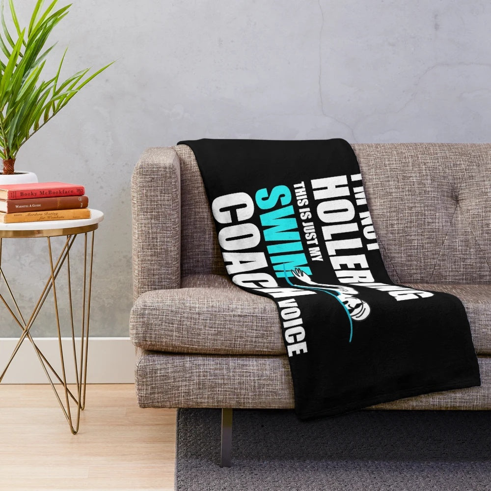Plush swimming-themed blanket with swimmer graphics