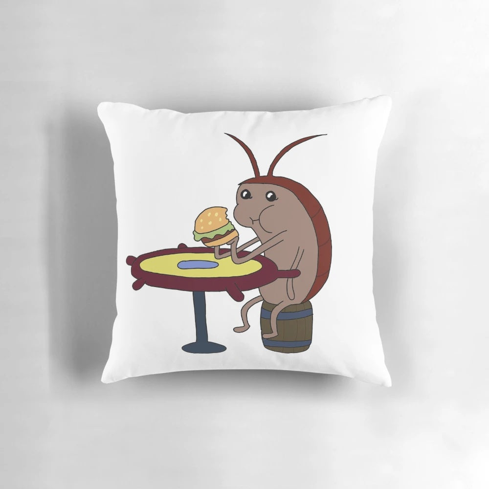 Colorful SpongeBob Squarepants-themed pillow with a cockroach eating a Krabby Patty