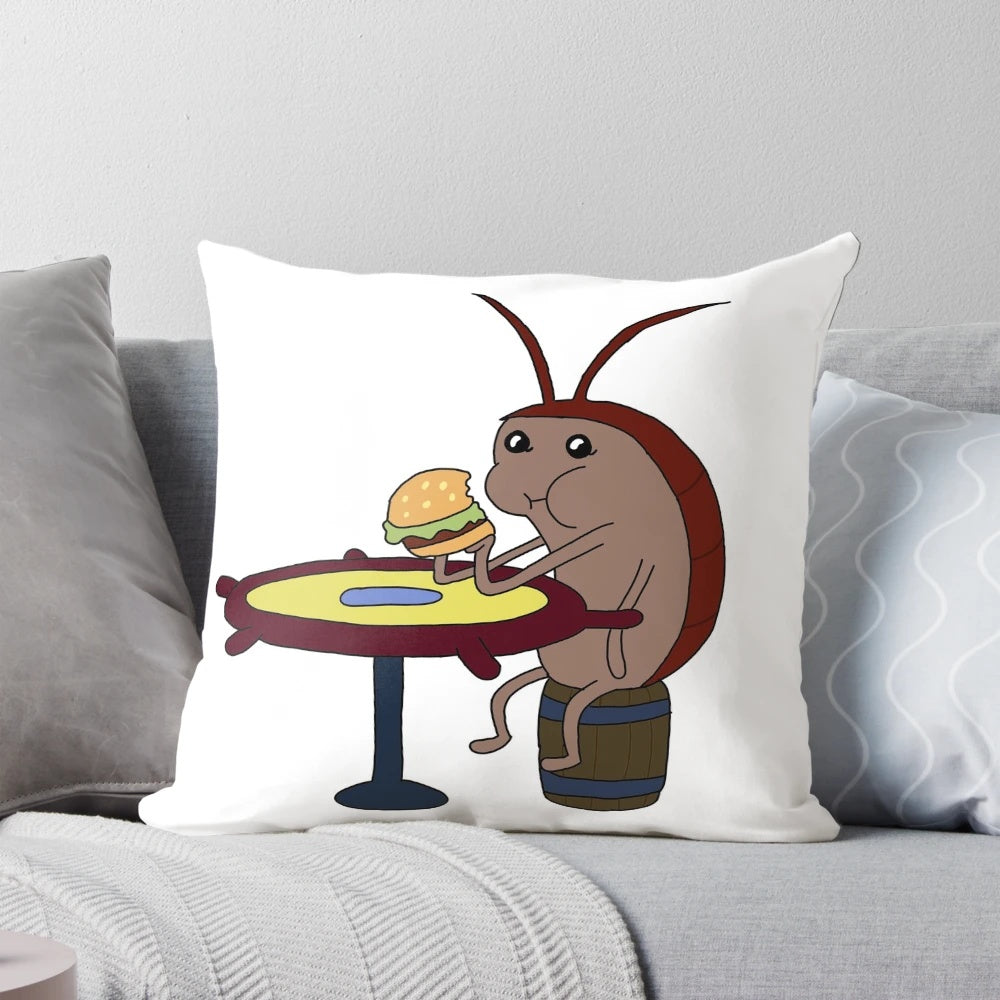 Colorful SpongeBob Squarepants-themed pillow with a cockroach eating a Krabby Patty