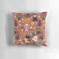A cozy and decorative Halloween-themed pillow with a seamless pattern featuring pumpkins, monsters, and other holiday graphics.