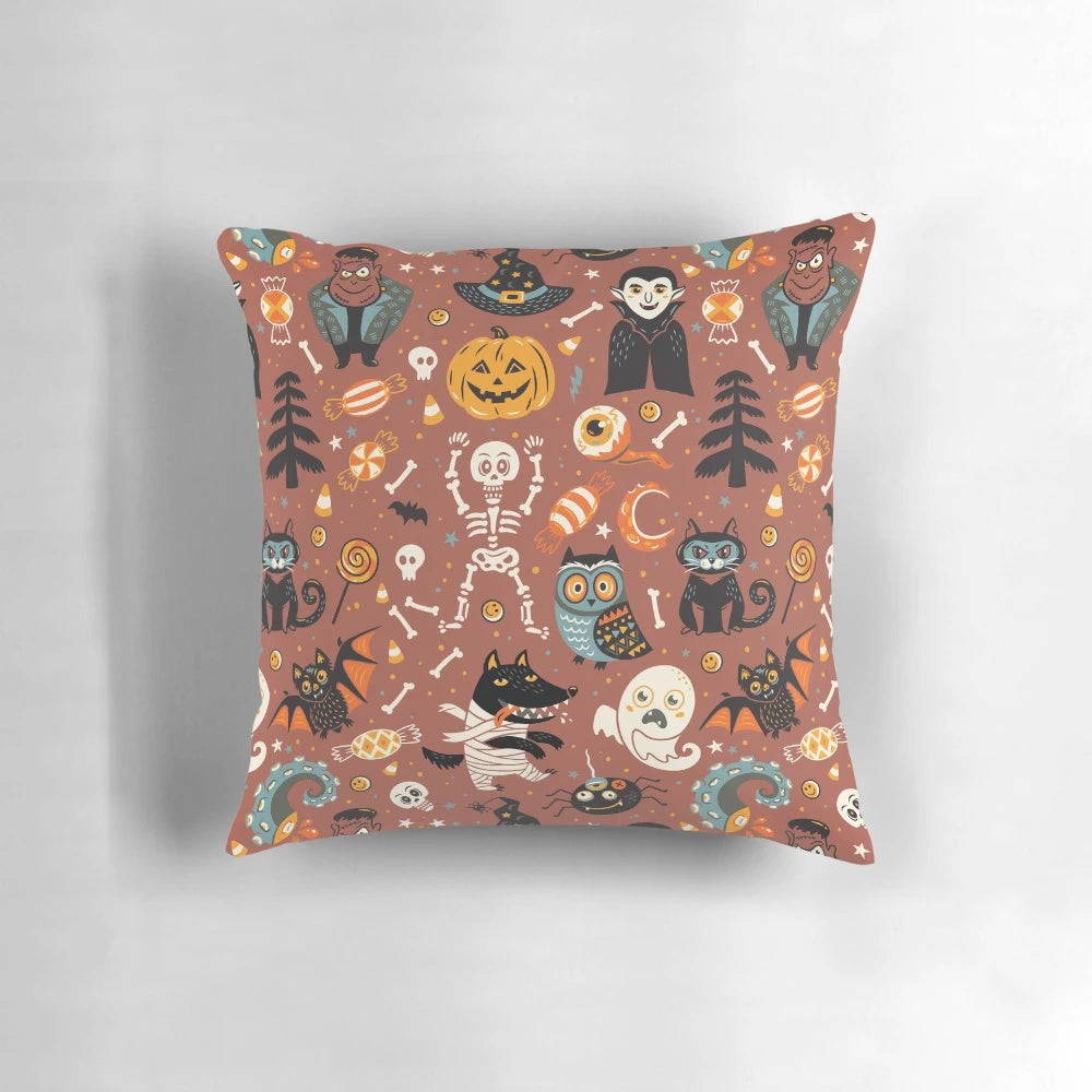 A cozy and decorative Halloween-themed pillow with a seamless pattern featuring pumpkins, monsters, and other holiday graphics.