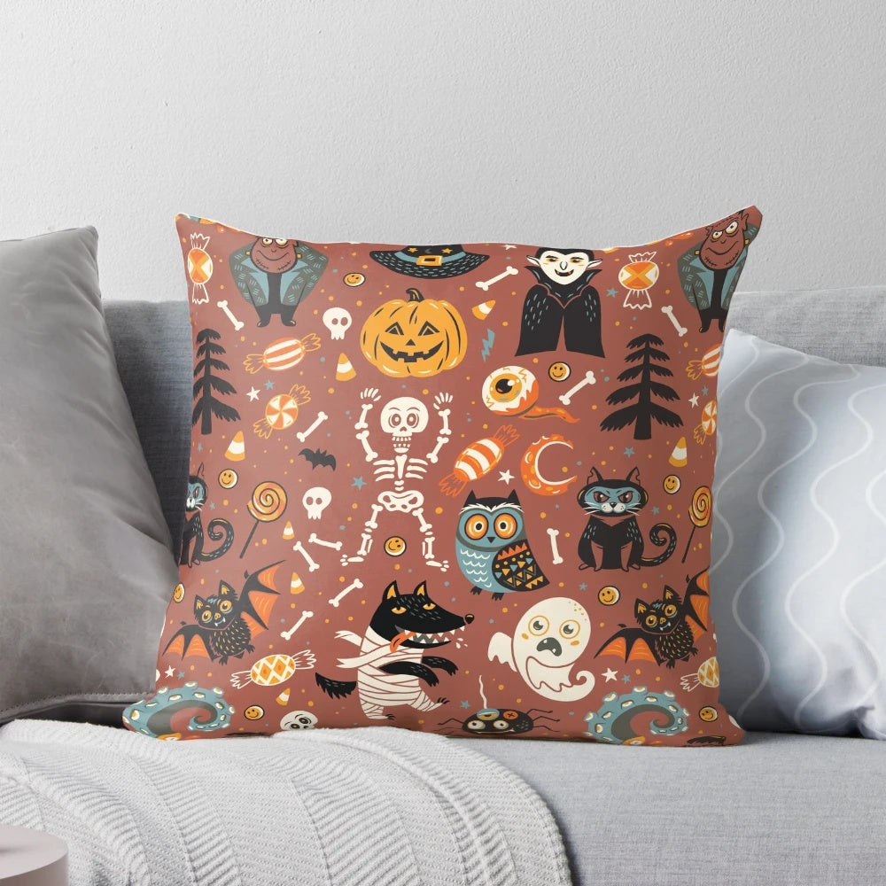 A cozy and decorative Halloween-themed pillow with a seamless pattern featuring pumpkins, monsters, and other holiday graphics.