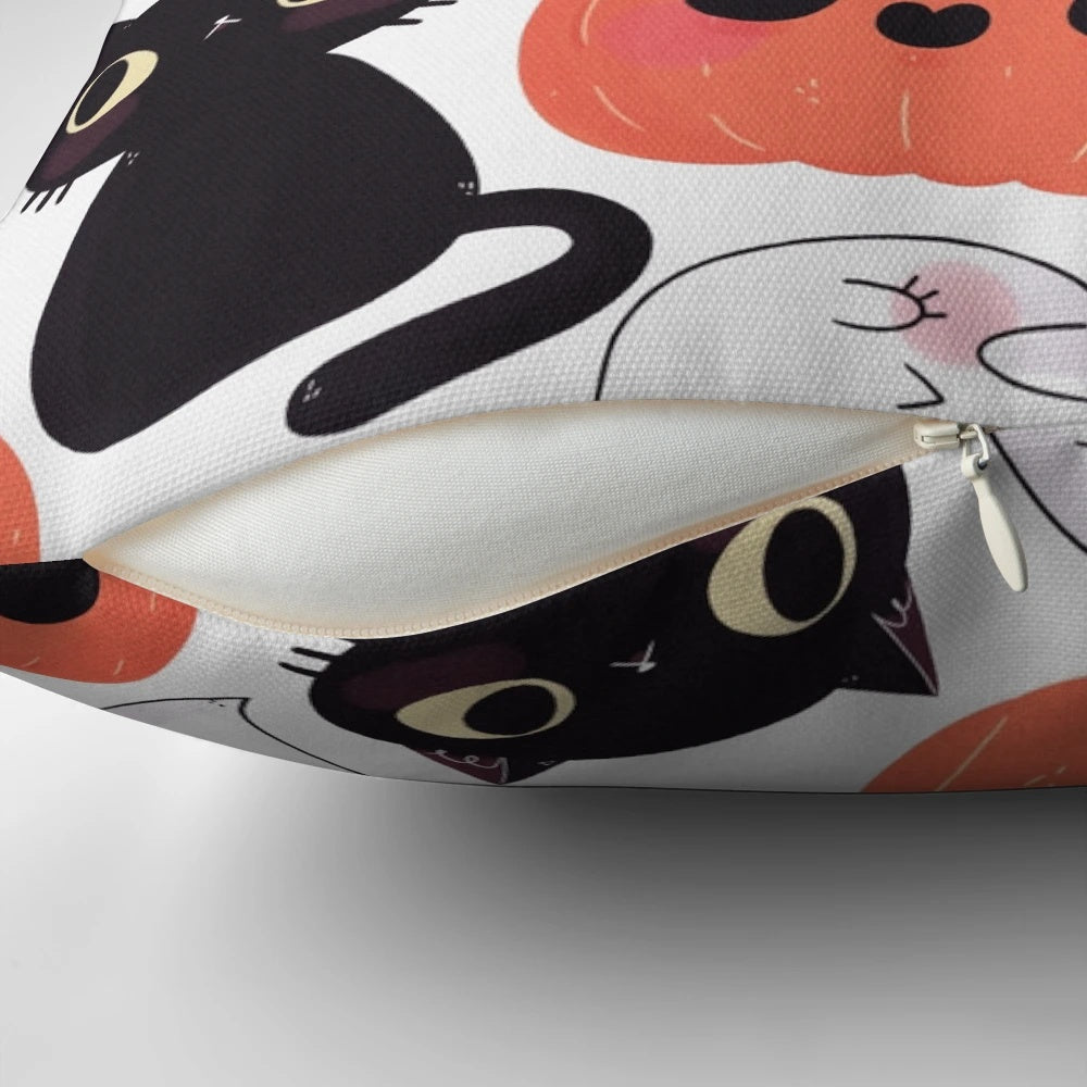 A cozy, spooky-themed pillow with a cute cat and pumpkin pattern