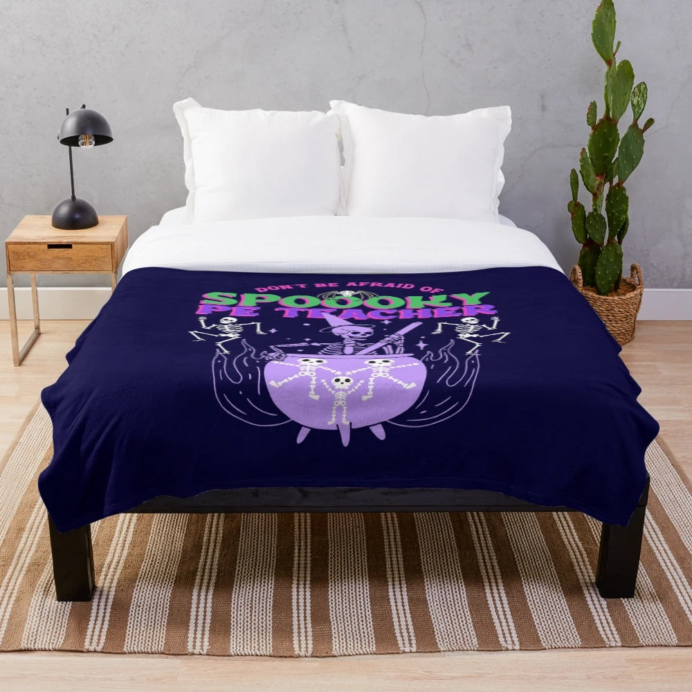 Spooky plush blanket featuring a teacher character
