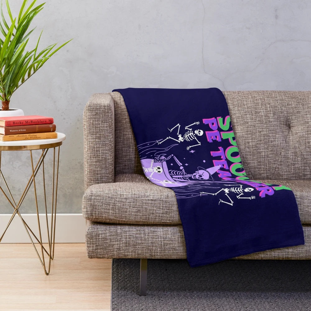 Spooky plush blanket featuring a teacher character