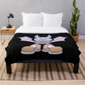 Bat-themed plush blanket for a spooky and cozy atmosphere