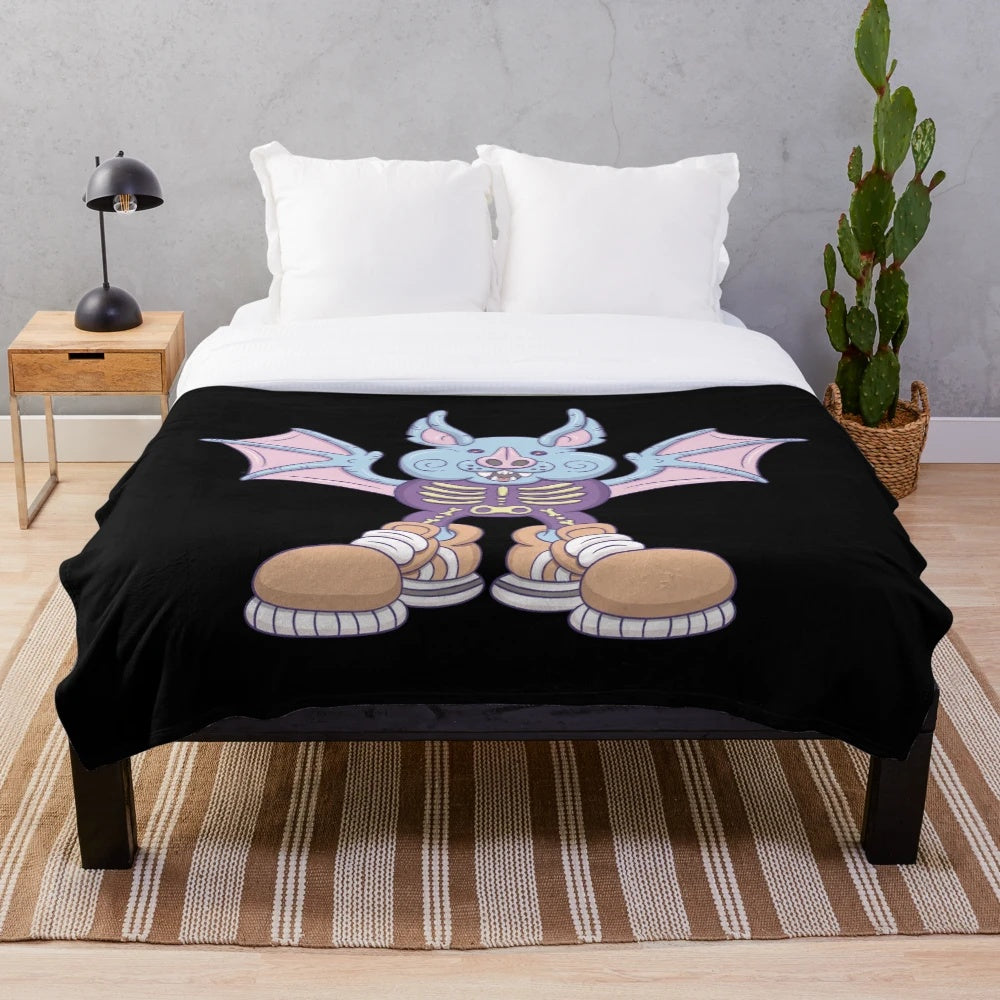 Bat-themed plush blanket for a spooky and cozy atmosphere