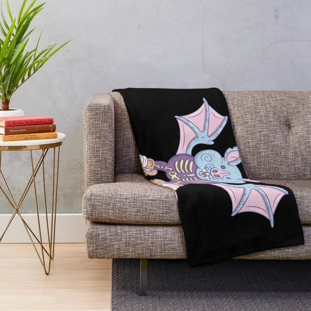 Bat-themed plush blanket for a spooky and cozy atmosphere