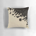 A Pillow featuring a sepia-toned image of a swarm of bats flying in the night sky.