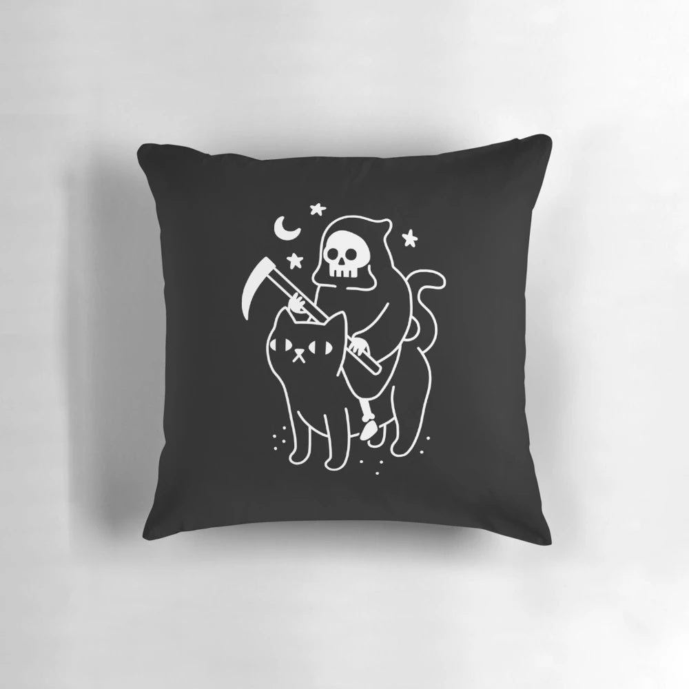 Decorative throw pillow featuring a black cat and grim reaper design in a spooky, horror-themed style.
