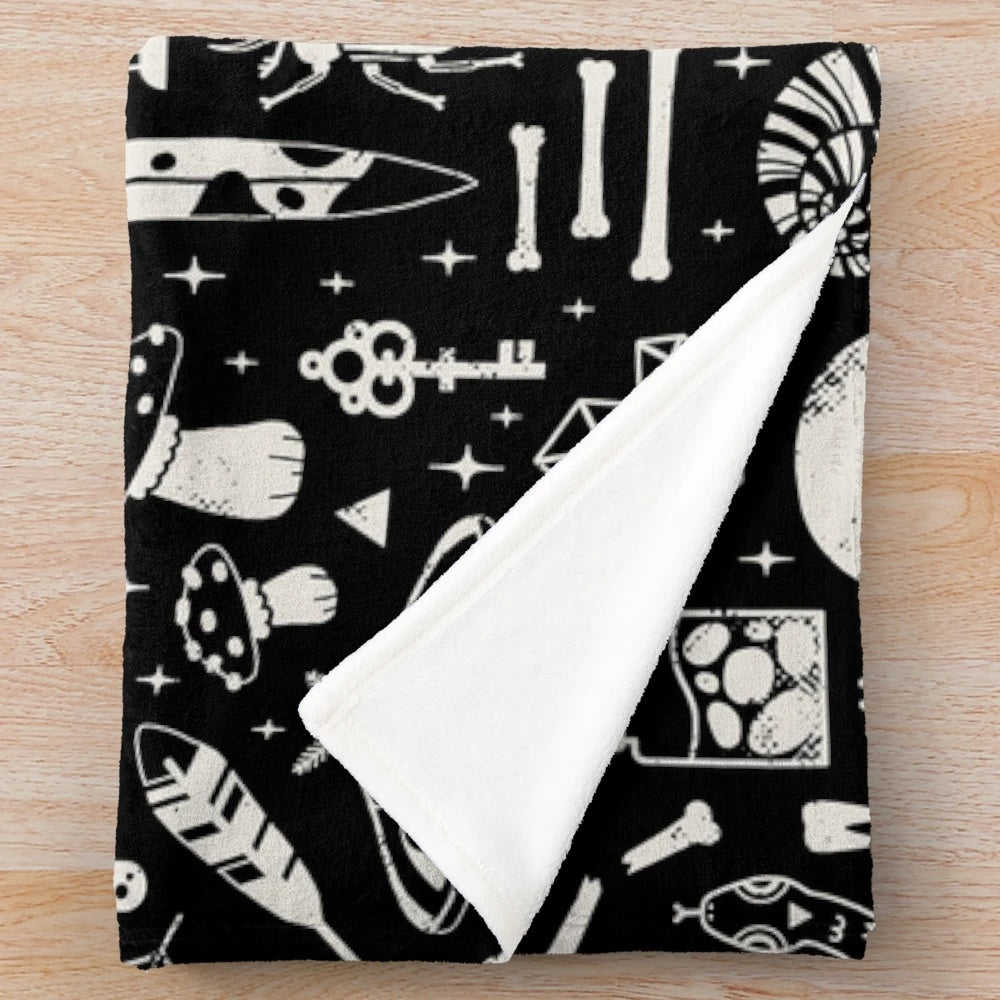 Bone black plush blanket with spooky, occult-inspired design