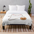Plush blanket featuring a cute cat ghost holding a pumpkin basket