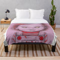 Chucky-inspired plush blanket with focus on horror movie theme