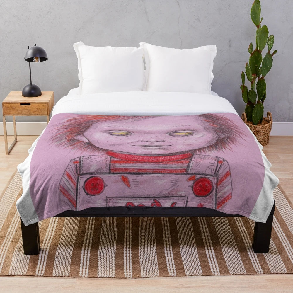 Chucky-inspired plush blanket with focus on horror movie theme