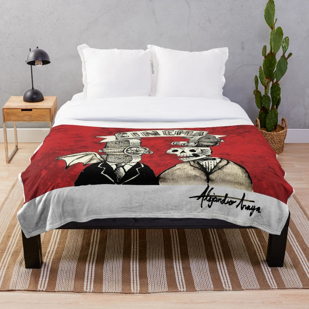 Spooky cinema-themed plush blanket with skeleton and skull design