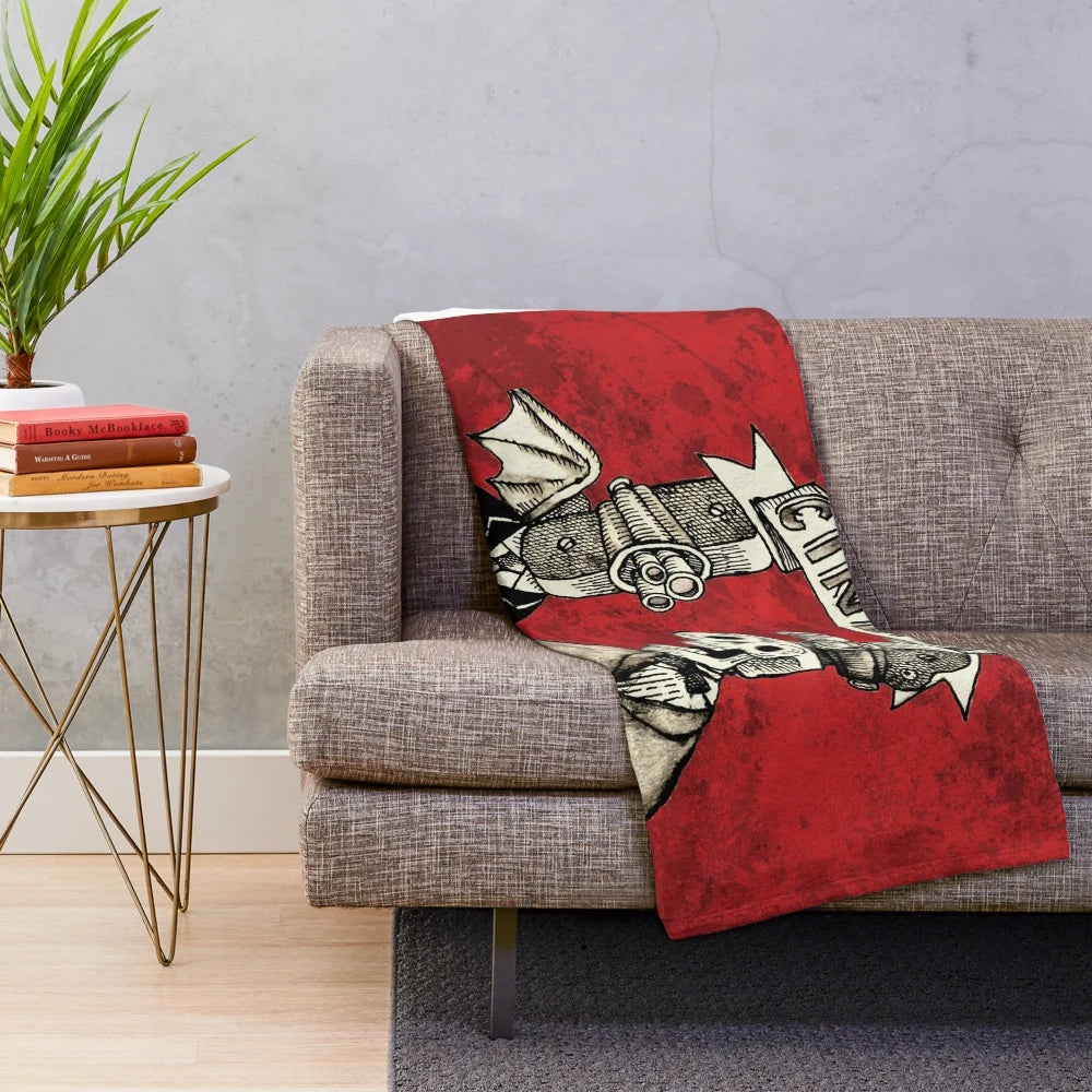 Spooky cinema-themed plush blanket with skeleton and skull design