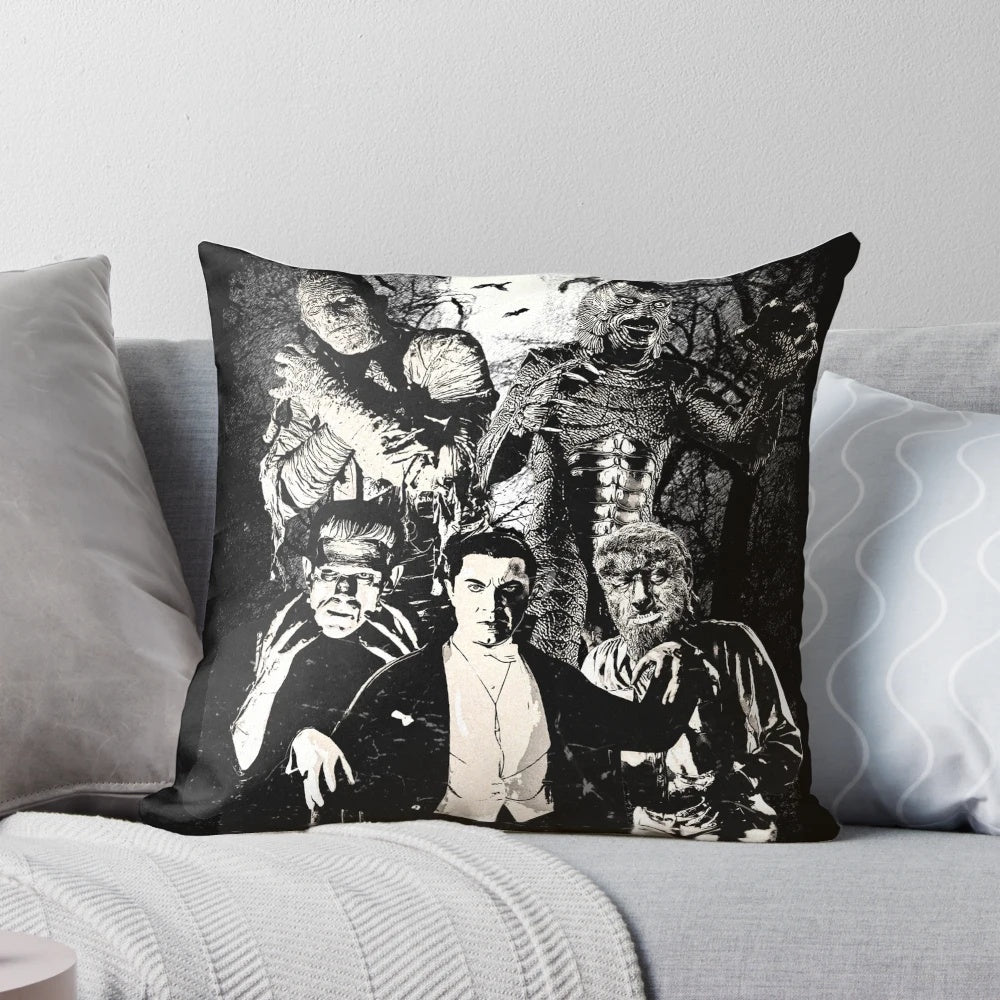 Decorative pillow featuring classic horror movie monsters like Dracula, Wolfman, and Frankenstein