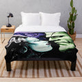 Plush blanket featuring the Bride of Frankenstein and Frankenstein's monster
