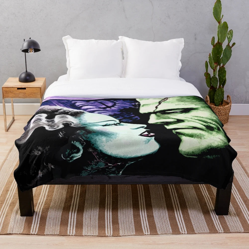 Plush blanket featuring the Bride of Frankenstein and Frankenstein's monster