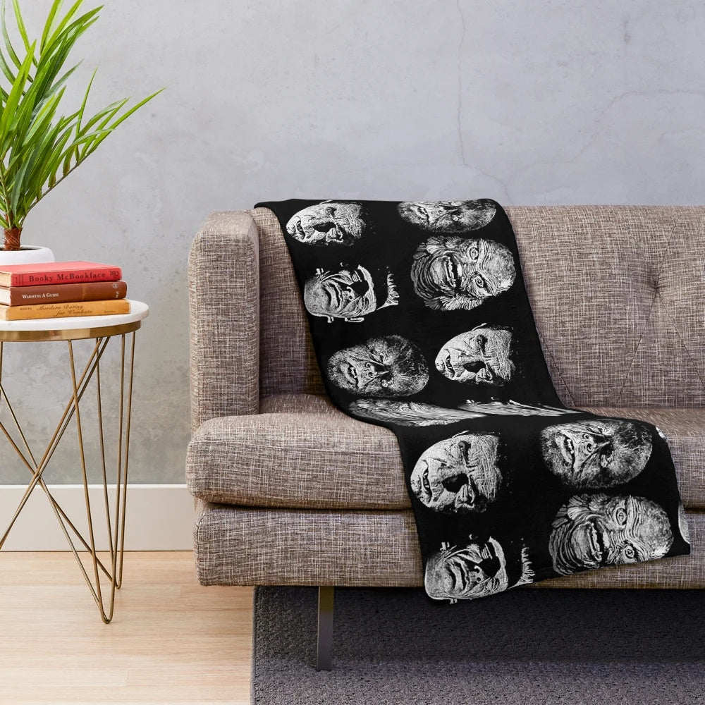 Classic horror-themed plush blanket featuring iconic monsters and characters