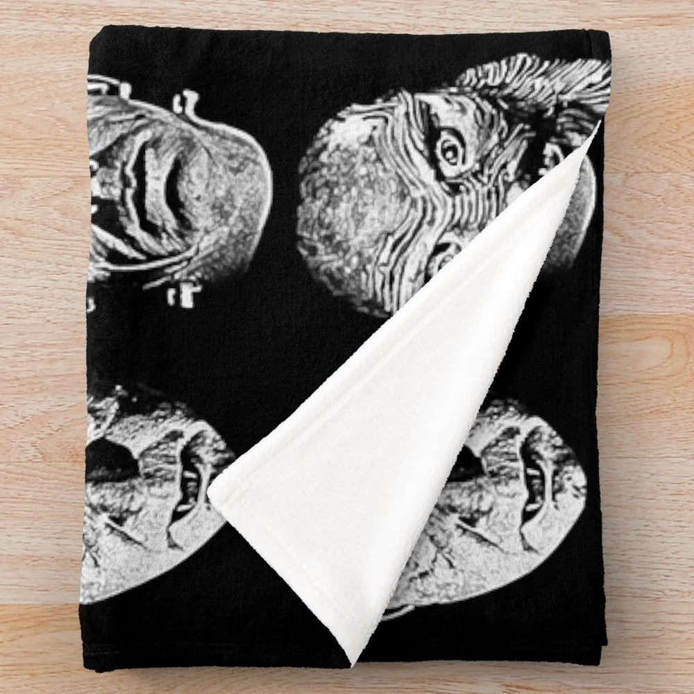 Classic horror-themed plush blanket featuring iconic monsters and characters