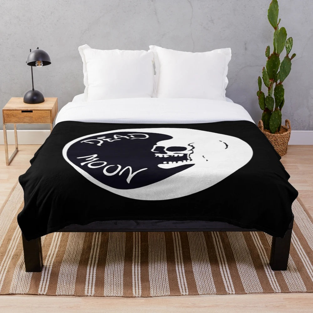 Cozy Dead Moon-themed plush blanket with moon skull design