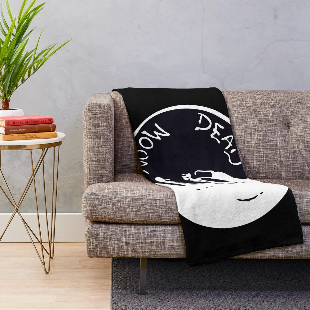 Cozy Dead Moon-themed plush blanket with moon skull design