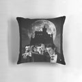 Decorative pillow featuring iconic horror movie characters like Dracula, Frankenstein, and the Wolfman